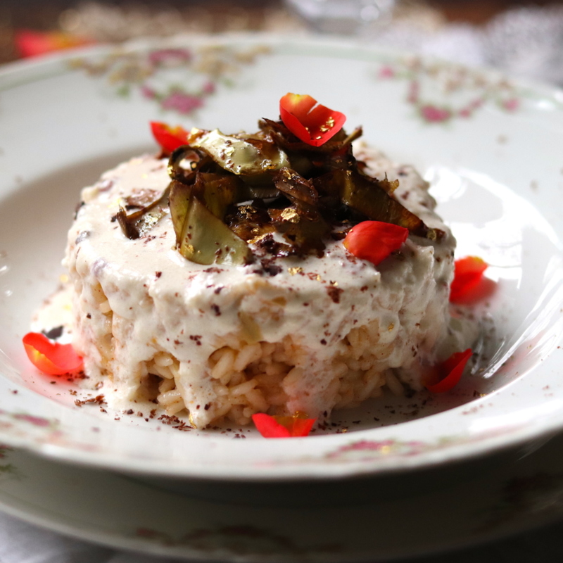 Timballo di riso con carciofi, fonduta di Castelmagno e cioccolato piccante